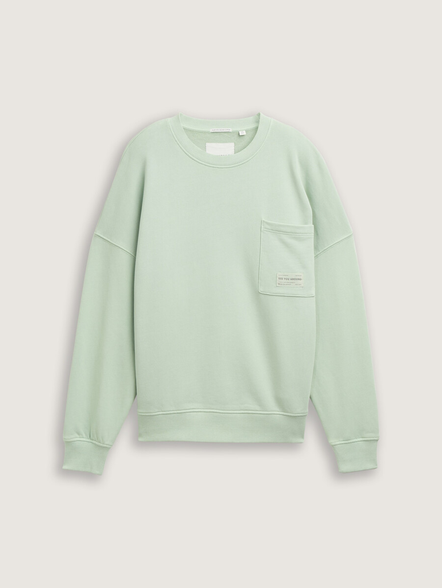 felpa oversize con taschino sul petto