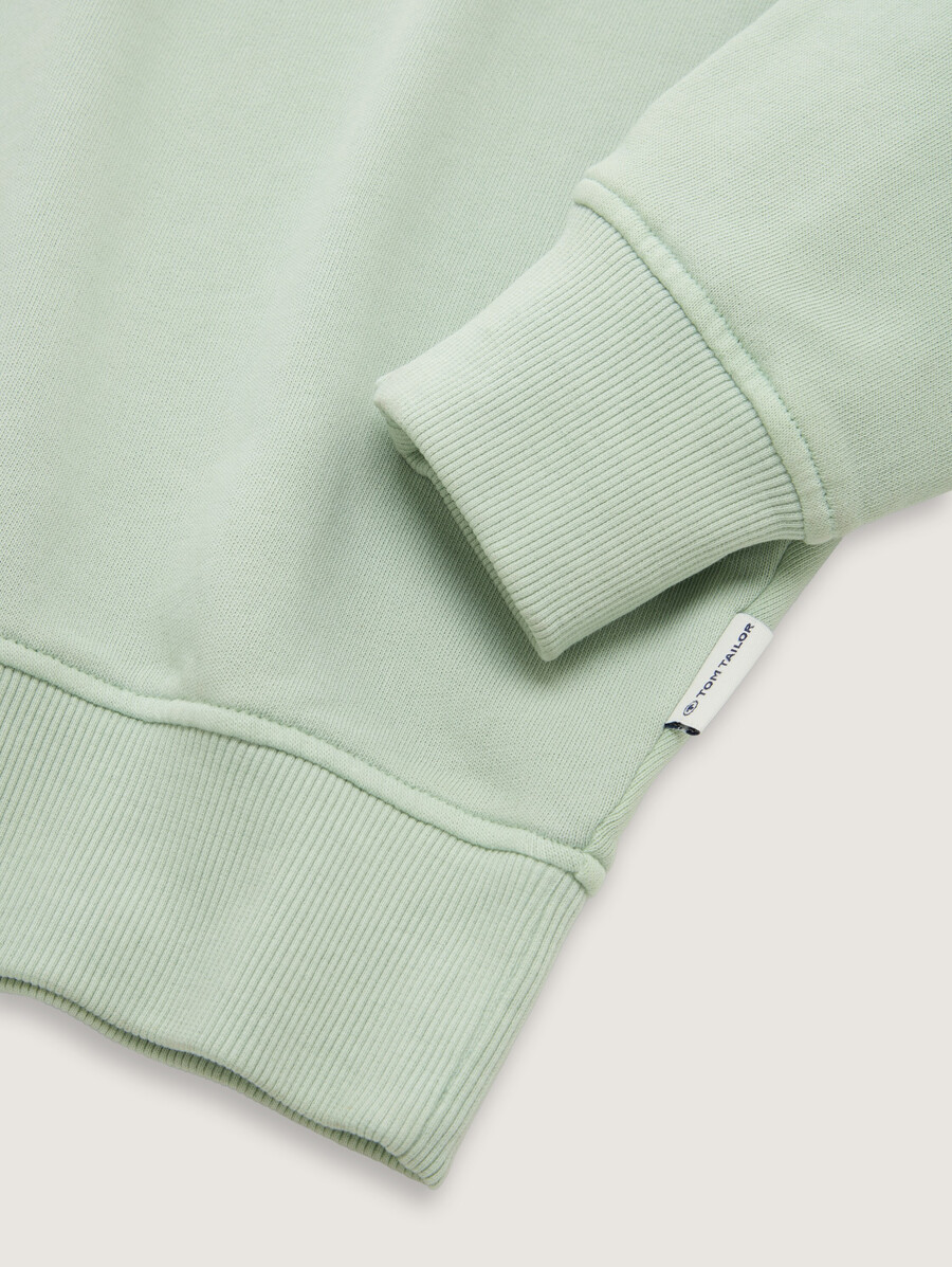 felpa oversize con taschino sul petto