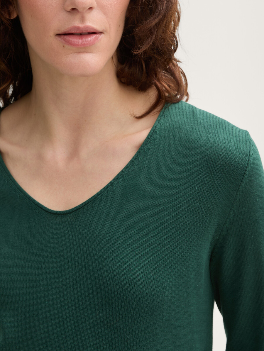 maglione lavorato a maglia con scollo a v