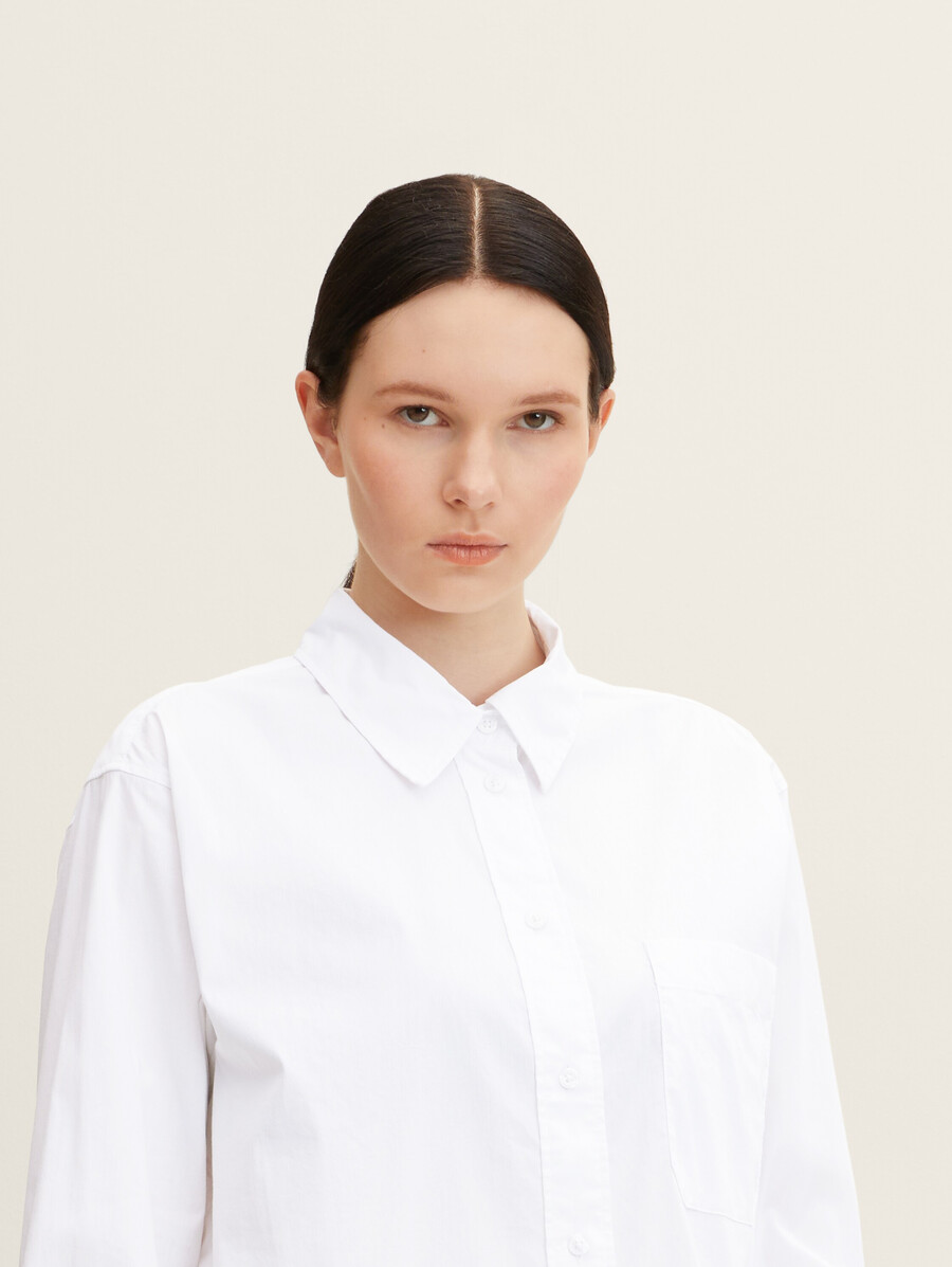 camicia lunga con taschino sul petto