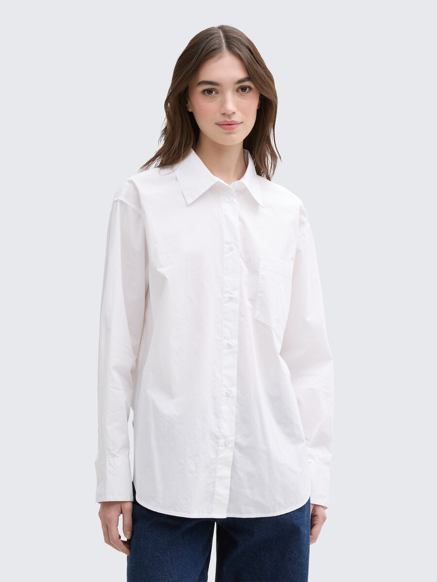 blusa oversize con taschino sul petto