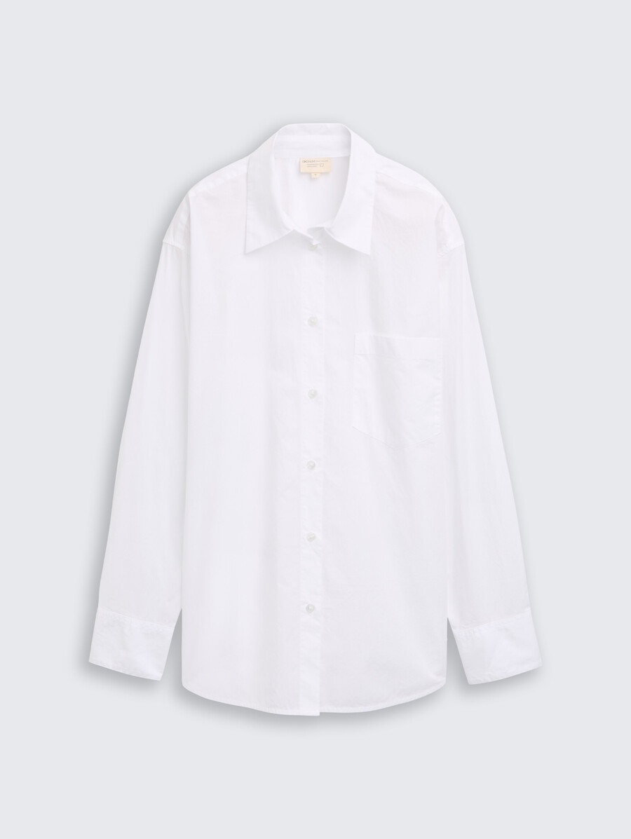 blusa oversize con taschino sul petto