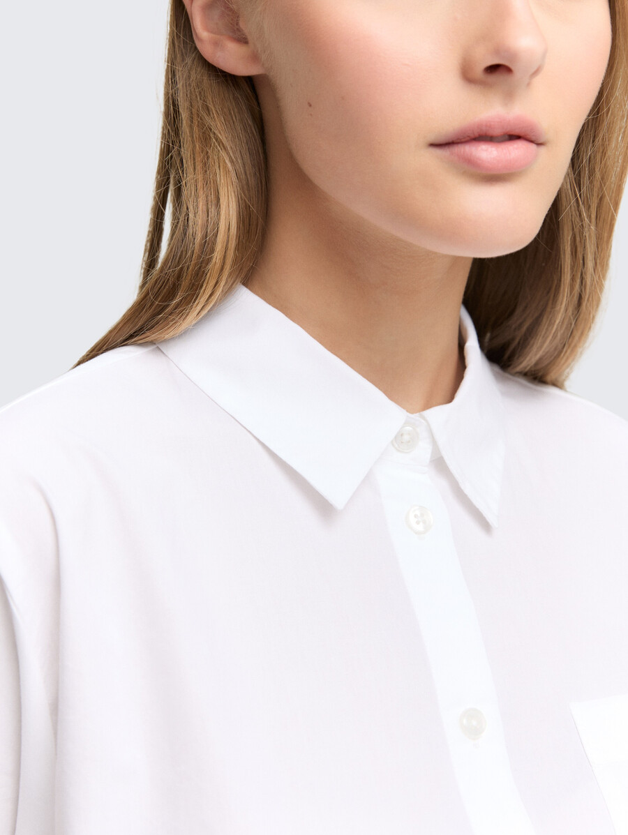 camicia a maniche corte con taschino sul petto