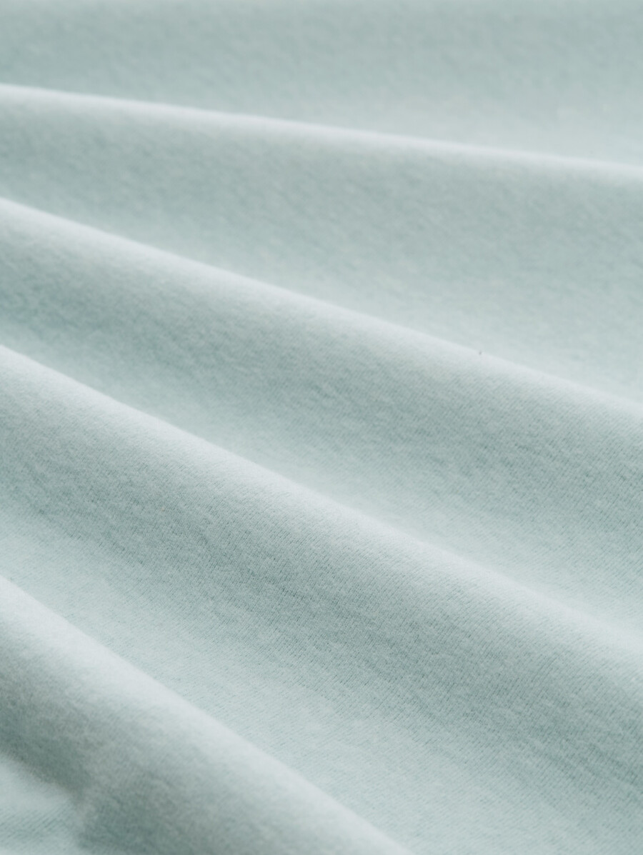 camicia a maniche lunghe con cappuccio e vestibilità ampia