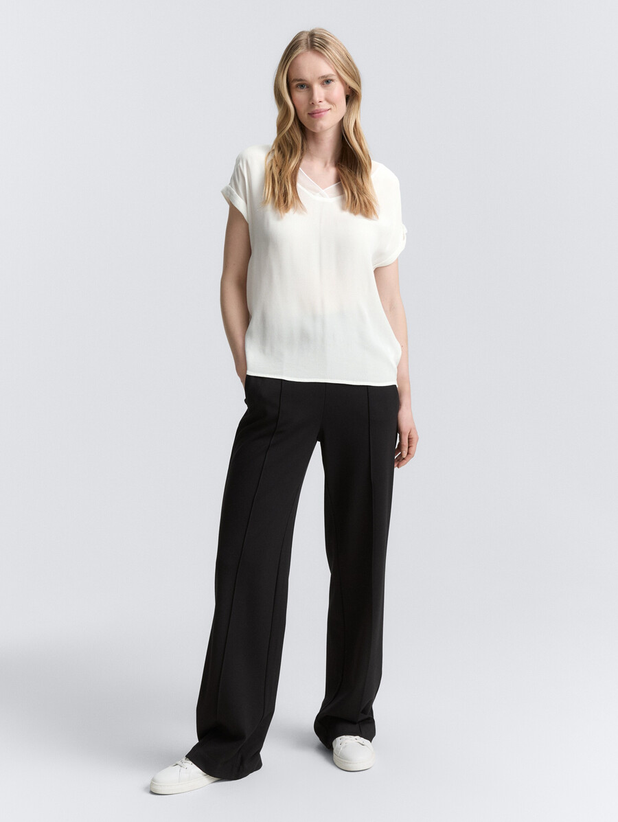 blusa ampia con scollo a v