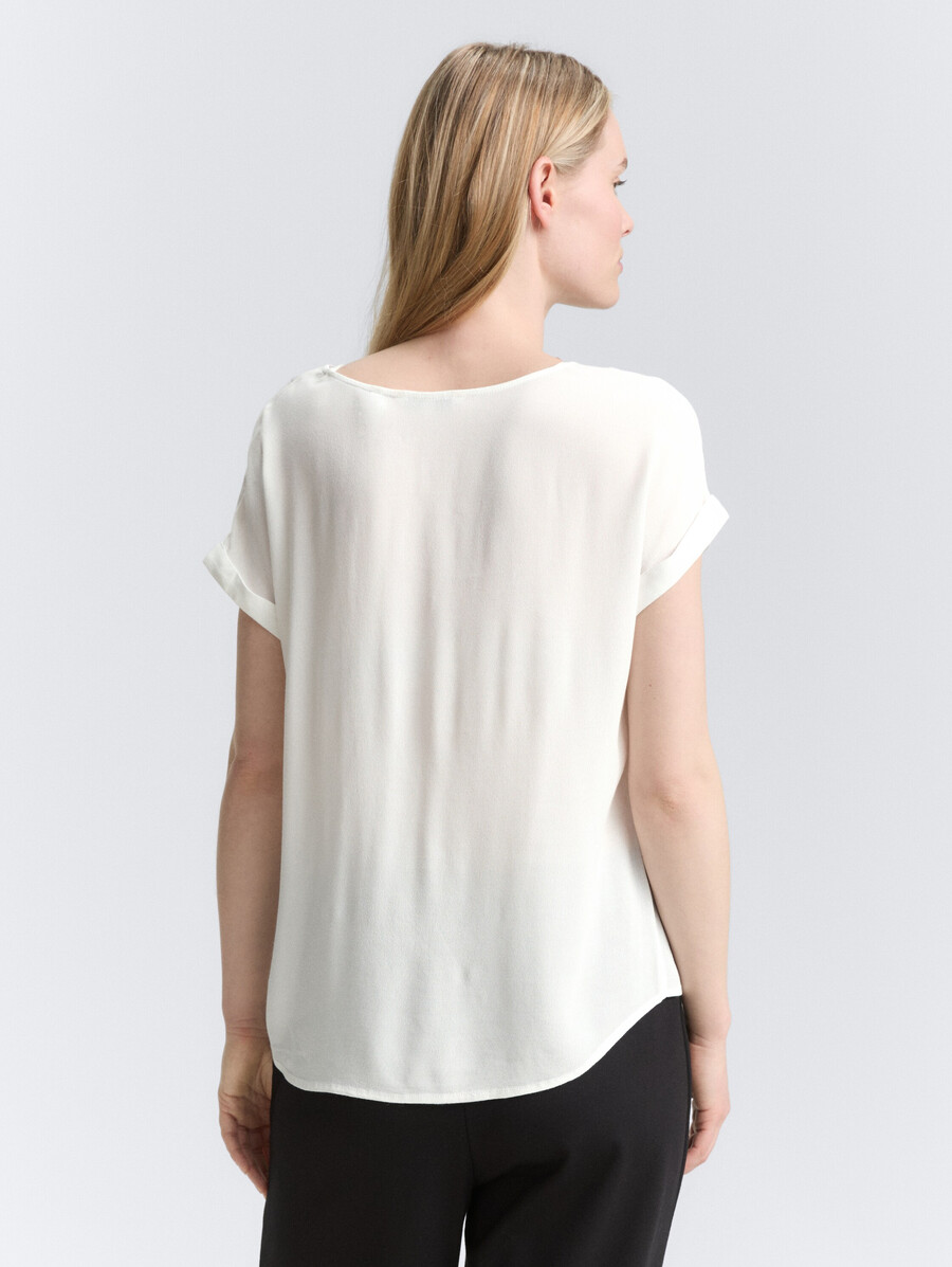 blusa ampia con scollo a v
