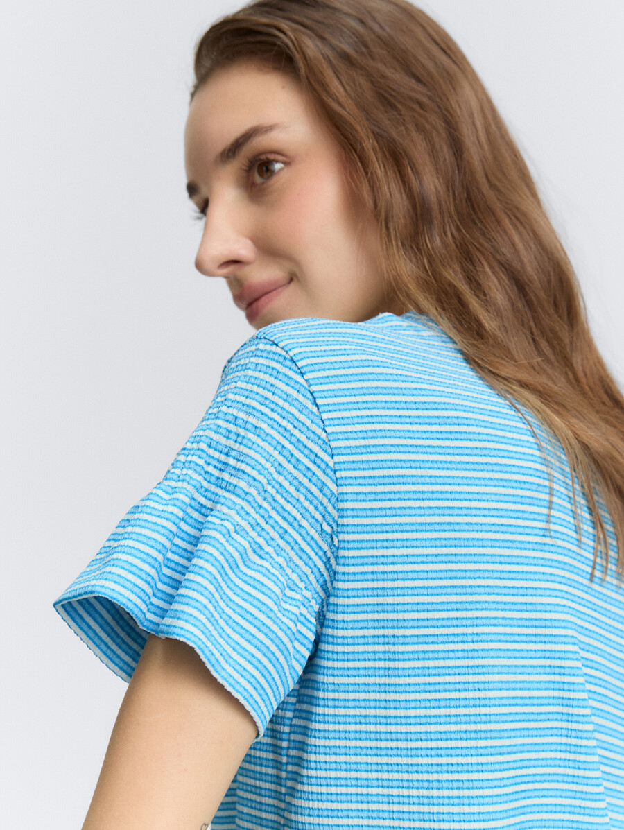 t-shirt con dettagli fumé