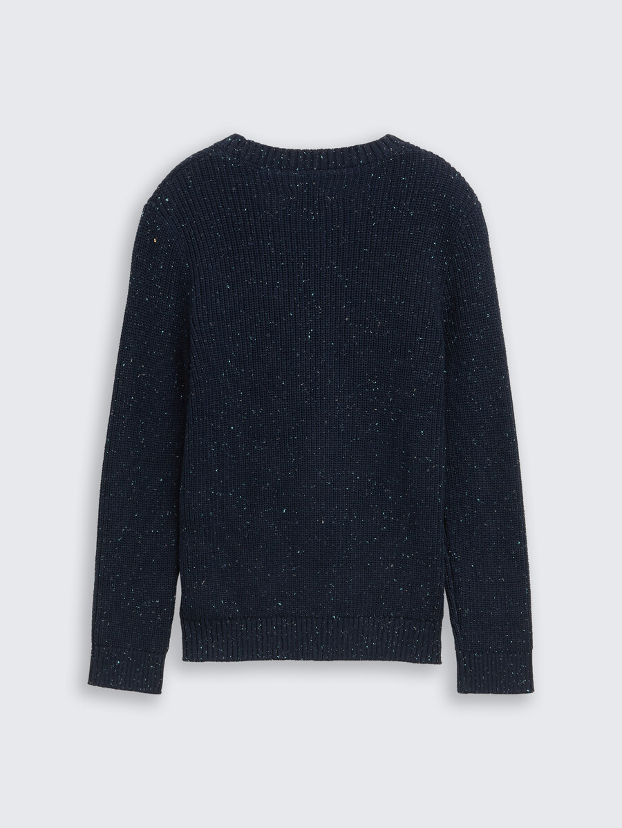 maglione lavorato a maglia con filato nodoso