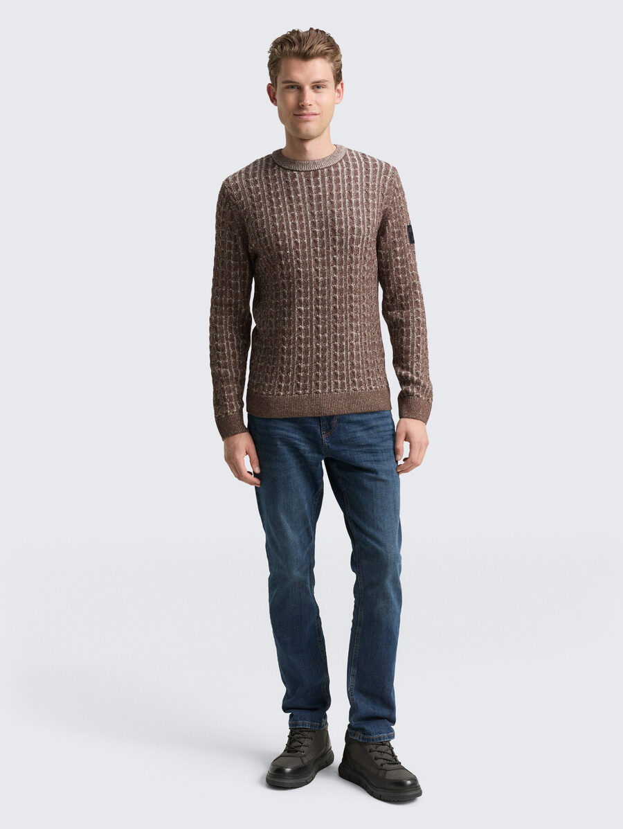 maglione lavorato a maglia con motivo a trecce