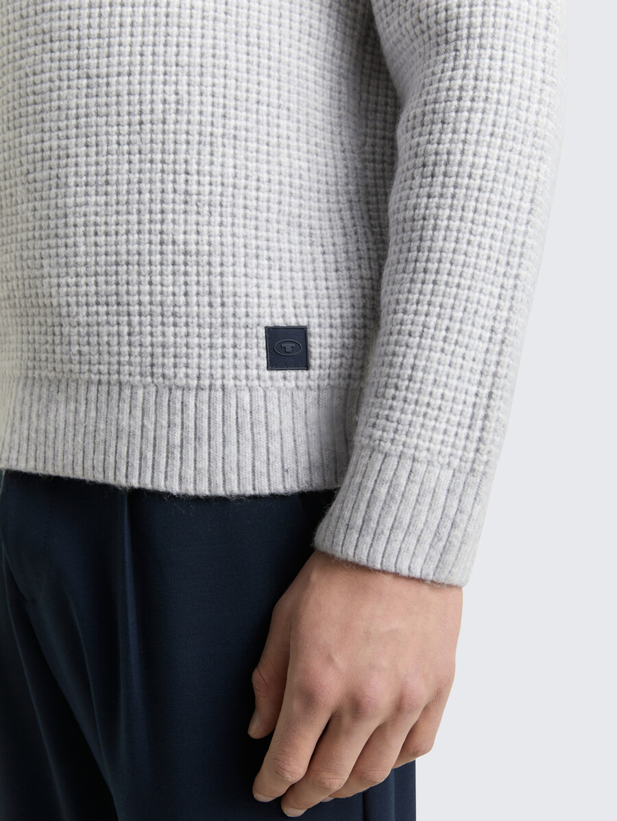 maglione lavorato a maglia con contenuto di lana